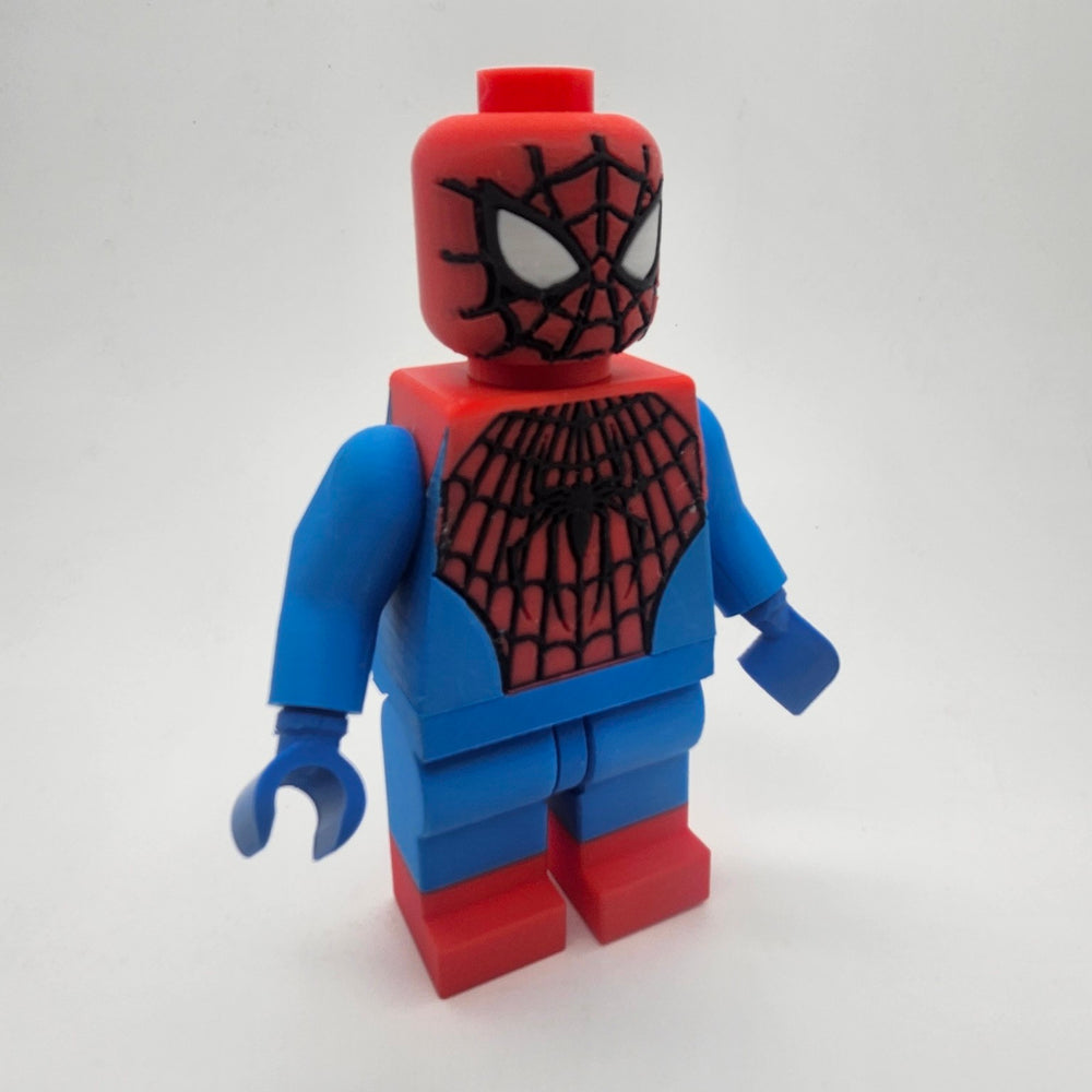 Oversized red and blue Spider-Man inspired brick-style collectible figure