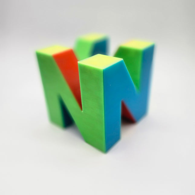 Glow in the dark N64 inspired multicolor retro gaming logo display