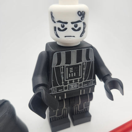Close-up of detailed black and gray armor on Darth Vader inspired oversized brick figure