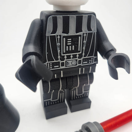 Close-up armor control panel and leg detailing on Darth Vader inspired brick figure